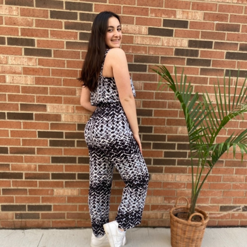 Distressed jumpsuit with pockets and thick strap